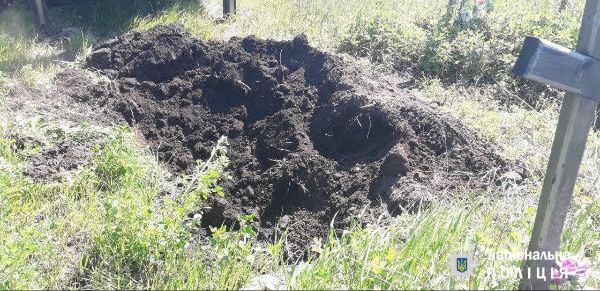 В Харьковской области нашли могилы российских солдат, среди убитых - подполковник (фото)