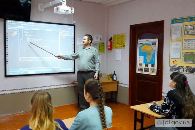Учитель у доски