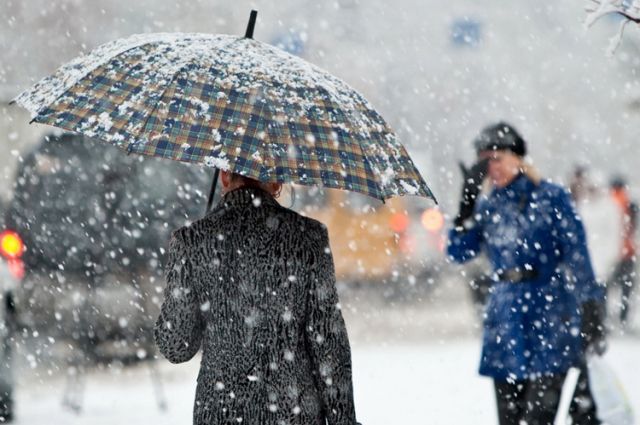 На Харьков идут дожди и снегопады